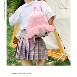 Girl wearing Sanrio My Melody plush backpack, pink and cute, perfect for students or leisure use, in a casual outdoor setting.